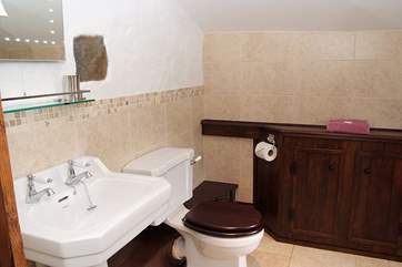 The shower-room is decorated to a high standard.