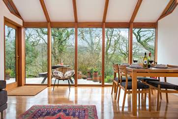 The floor to ceiling windows really let the light in and take full advantage of the views of the garden.