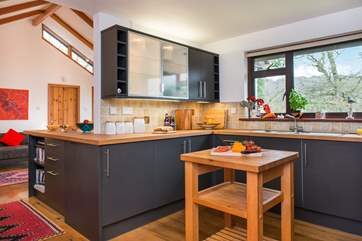 The living-area leads off from the kitchen....