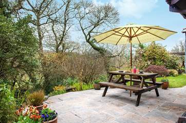 The patio-area in front of Beechwood is a very sunny spot and the perfect place to enjoy al fresco dining and the wonderful setting.