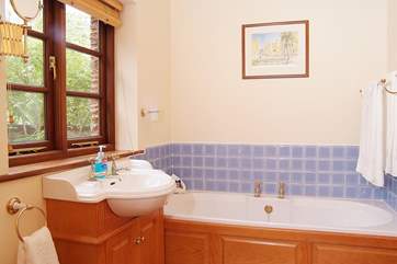 The family bathroon on the ground floor. There is a separate shower-room too.