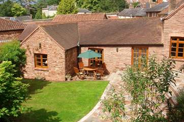 A view of the cottage in its village setting.