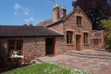 Court Cottage has a fully enclosed garden and patio with two sets of French windows to make the most of the lovely setting.