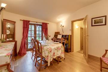 The dining room is a step down from the kitchen and there is a further quite deep step down to the corriridor to the twin bedroom and the bathrooms.
