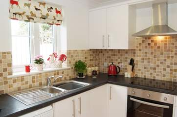 Fun fabrics are used in the kitchen.