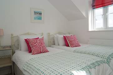 The twin bedroom has an en suite bathroom.