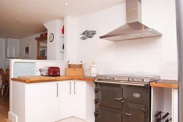 The kitchen-area, with it's Everhot range, leads through to the dining and second sitting areas.