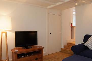 The sitting-room has three steps to the open plan living-room.