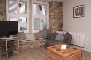 The lovely sitting-area overlooks Mousehole harbour.