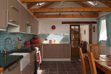 The kitchen is beautifully fitted and well-equipped.