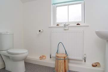 There are pretty decorative touches throughout the cottage, even in the shower-rooms.