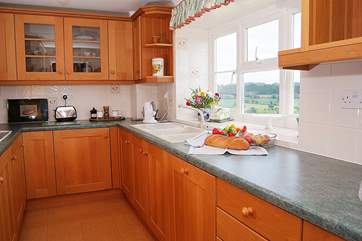 The galley-style kitchen is really well-equipped -making this a real home-from-home cottage.