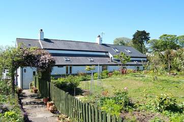 Trelyn (on the right) is a self-contained annexe attached to the Owners' home, which has a beautifully planted garden.