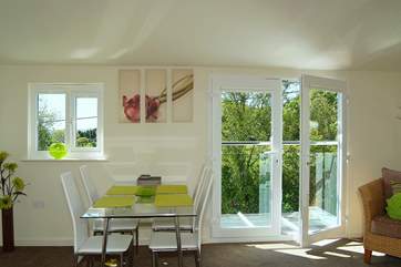 Glass doors with a Juliet balcony make the most of the far reaching countryside views.