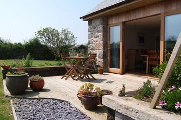 The private sunny garden and terrace.