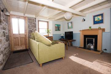The entrance is in the sitting-room.