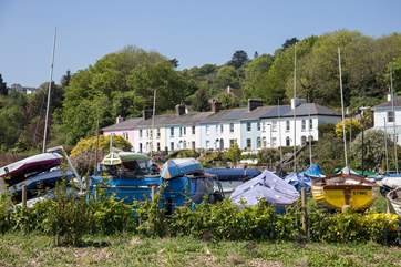Looking back to Chindit Cottage from the side-walk along the river Dart.