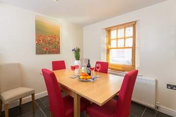 The dining-area is at the far end of the kitchen and there is comfortable seating for the seven guests that the house accommodates.