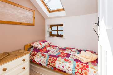 This is the single bedroom - another friendly and welcoming room.