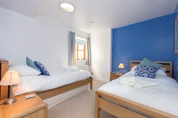 Another view of the twin bedroom with its seaside colours.