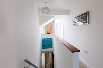 The first floor landing runs the length of the house linking all the bedrooms.