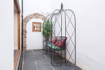 There is a little inner courtyard with bi-fold doors opening from the kitchen.