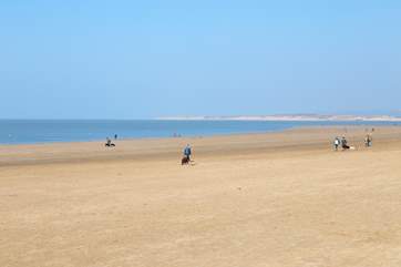 The wonderful sandy beach within steps of your holiday home.