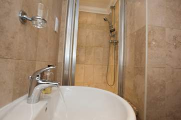 The shower-room en suite to Bedroom 1.