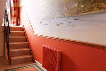 The mural in the hallway shows the view you see from the apartment.