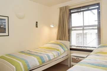 The twin bedroom has 3' single beds.