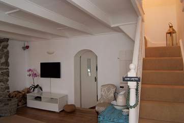 Typically steep cottage stairs lead up to the first floor (please mind your head!).