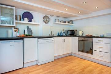 The kitchen is on the lower ground floor, please watch your head on the traditional beams.