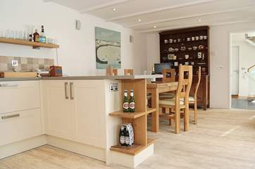 The kitchen/dining-room lends itself to leisurely meals.