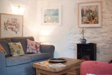 An electric wood-burner effect stove to keep you warm on cooler days.