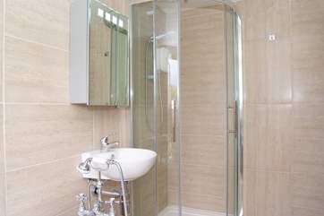 The bathroom has a separate shower cubicle too.
