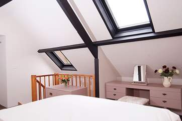 The double bedroom uses the whole of the first floor space.
