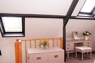 The stairs lead directly into the bedroom and there is plenty of light from the two Velux windows.