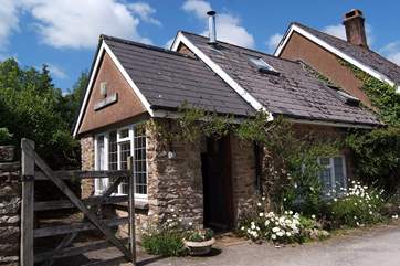 Creenagh's Cottage is to the left of this picture, in its pretty setting at Knighton Farm.