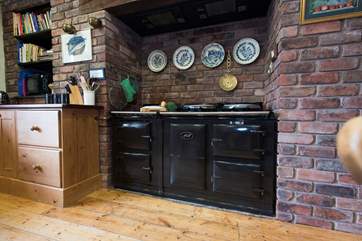 A double oven Aga will keep the kitchen cosy and warm whilst you prepare a family meal.