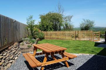 The small enclosed garden has lovely rural views.