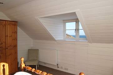 A second window set into the sloping roof allows light to flood in to Bedroom 2...