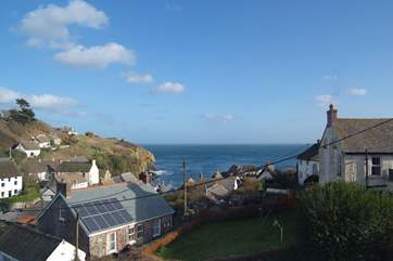 The view across the village to the beach from Bedroom 2.