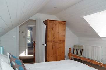 Bedrooms 2 and 3 are on either side of the staircase.