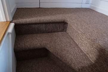 The turning top few steps of the original cottage staircase - please take care when stepping out of the double bedroom!