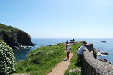 The 'Todden', which divides the cove into two, is a wonderful vantage point for watching the comings and goings on the beach below.