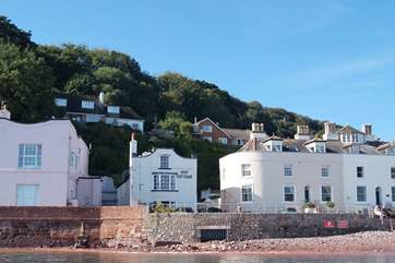 Bay Cottage is on the ground floor of the house in the middle of the photograph.