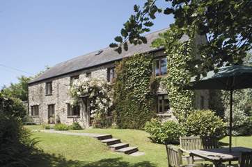 The front of Hooppells Barn with its pretty enclosed garden.
