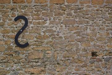 The original stone walls of this barn celebrate its traditional character.
