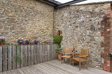 This very sheltered spot is at the botom of the steps that lead up to your loft.