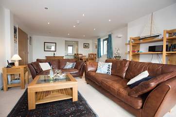 The spacious sitting/dining-room.